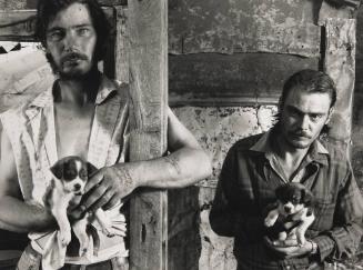Napier Brothers with Puppies