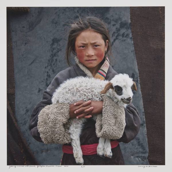 Young Tibetan Nomad with Lamb